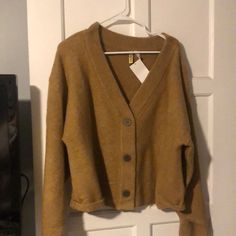 Tan H&M Cardigan, Kinda Baggy In The Sleeves And A Little Shorter Length. 52% Acrylic 30% Polyamide And 15% Wool. 3 Big Buttons On The Front. H&m Long Sleeve Cardigan For Fall, H&m Long Sleeve Fall Cardigan, Casual H&m V-neck Cardigan, H&m V-neck Cardigan For Spring, H&m V-neck Fall Outerwear, H&m V-neck Spring Cardigan, Brown Shawl, Fine Knit Cardigan, Oversized Sweater Cardigan