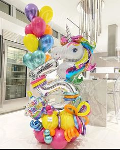 an instagram photo with balloons and a unicorn on it