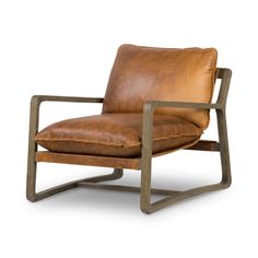 a brown leather chair sitting on top of a wooden frame