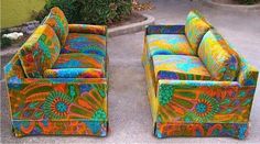 two colorful couches sitting next to each other