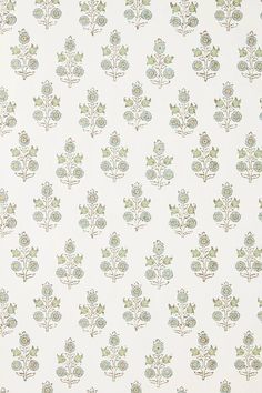 a white wallpaper with blue and green flowers on it