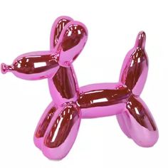 the balloon dog is pink in color