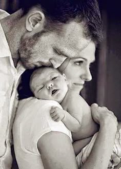 a man and woman holding a baby in their arms with the caption'naming your baby '