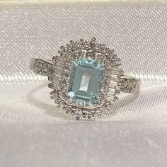 Gorgeous 7x5mm Emerald Step Cut Natural Brazilian Aquamarine With Baguette & Round Cut Accents In A Platinum Plated Solid Sterling Silver Setting, Stamped 925! Handmade One Of A Kind Design Checkout My Large Collection Of New Aquamarine Jewelry Available On My Page Aquamarine Jewelry, Aquamarine Ring, Step Cut, Double Halo, Aquamarine Rings, Platinum Ring, Natural Aquamarine, Halo Ring, Baguette Diamond