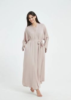 Serena Abaya Set - Light Nude Spring Workwear Abaya, Spring Long Abaya, Elegant Wrap Maxi Dress For Daywear, Elegant Workwear Abaya In Maxi Length, Elegant Belted Abaya, Chic Long Abaya For Eid, Elegant Spring Abaya For Workwear, Elegant Spring Workwear Abaya, Chic Long Abaya