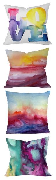 four pillows with the words love painted on them