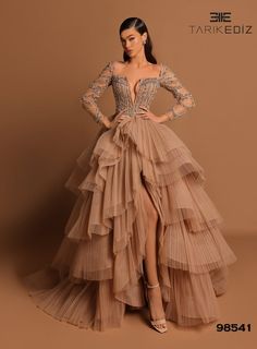 Tarik Ediz Evening Dress Tarik Ediz: 98541 Tarik Ediz Wedding, Tulle Couture Dress, Gold And White Dresses For Women, Wedding Dress With Textured Skirt, Long Sleeved Tiered Dress, Wedding Guest Ball Gown, Iconic Long Dresses, Full Sleeves Dresses For Women, Haute Couture Blouse