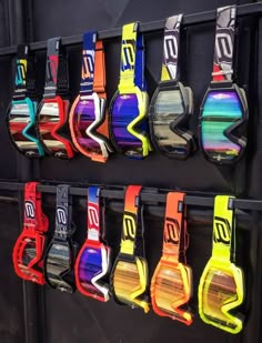 colorful goggles are hanging on the wall