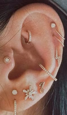 three different types of ear piercings