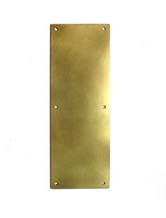 a metal plaque with rivets and holes on the front, against a white background