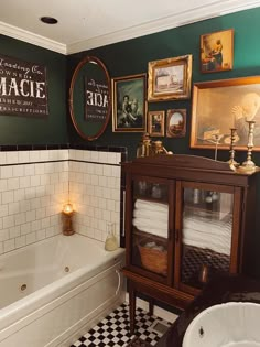 a bathroom with green walls and black and white checkered flooring is pictured in this image