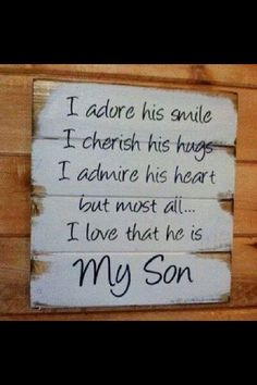 a wooden sign that says, i adore his smile i cherish his hugs i admire his heart but must all i love that he is my son