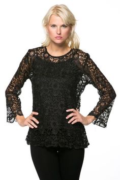 BTT-02451 Stylish and lovely, this lace top is sure to make an impression on any occasion. Perfect for formal and casual events, the lace set features a chic, long sleeve top with a rounded neck and a scalloped hem. The sleeves have a slight flare at the cuff that gives this set an extra dash of refinement. Five buttons in the back secure this trendy lace blouse. The sheer blouse goes over a simple black tank top. Material: Tank Top: 93% Polyester, 7% Spandex, Blouse: 100% Cotton Care Instructio Elegant Long Sleeve Top For Evening, Long Sleeve Lace Patchwork Top For Night Out, Stretch Lace Top For Night Out, Chic Scalloped Lace Top For Fall, Chic Scalloped Lace Top For Spring, Elegant Formal Tops With Lace Sleeves, Elegant Long Sleeve Top For Fall Party, Black Lace Top With Crew Neck, Elegant Black Top With Scalloped Lace