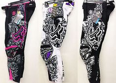 three different types of leggings hanging up against a wall with the same pattern on them