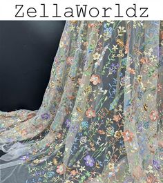 an image of a sheer fabric with flowers on it and the words zellaworlddz