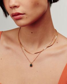 Lucy Williams Square Onyx Gemstone Necklace | 18ct Gold Plated Vermeil/Black Onyx. A Semi-Precious Addition to Your Layers. Paired with a Delicate Chain, the Square Onyx Pendant, Known as the Protection Stone, Creates a Distinctive Focal Point. Layer this Best Selling Piece with a Longer Necklace or Coin Choker for a Lucy Williams Duo You'll Never Take Off. Metal: 18Ct Gold Plated Vermeil on Sterling Silver Gemstone: Black Onyx Pendant Dimensions: 8mm X 8mm Total Length: 450 mm with Extensions a Elegant 14k Gold Necklace With Black Enamel, Elegant Black Enamel 14k Gold Necklace, Elegant Onyx Necklace With Black Enamel, Luxury Black Chain Necklace, Chic Formal Gemstone Jewelry, Formal Black Gold-plated Necklace, Formal Black Gold Plated Necklace, Gold Onyx Pendant Jewelry, Elegant Onyx Necklace With Polished Finish