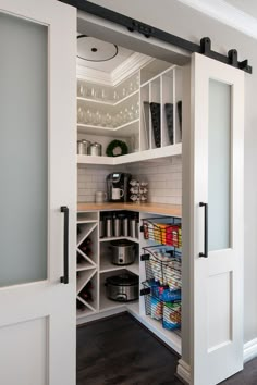 an open pantry with lots of items in it