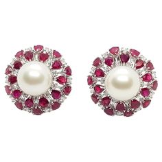 South Sea Pearl with Ruby 8.0 carats and Diamond 1.30 carats Earrings set in 18 Karat White Gold Settings Width: 2.6 cm Length: 2.6 cm Total Weight: 24.46 grams "We first opened doors in 1980 when it was then situated in the vicinity of the Victory Monument; a small and modest storefront with a couple of counters. From its humble beginnings to where it stands today, our company has proven its abilities as a jeweler. Since the beginning, we have been supplying fine quality pieces to dealers, whol Exquisite White Diamond Pearl Earrings, Luxury Classic Diamond White Pearl Earrings, Luxury Red Pearl Earrings, Elegant Style, Luxury White Pearl Gold-plated Earrings, Luxury Pearl Earrings With Diamond Accents, Round Cut, South Sea Pearls Earrings, Golden South Sea Pearls, White Gold Set, South Seas