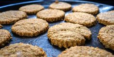 some cookies are sitting on a baking sheet