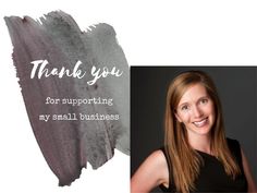 a woman is smiling for the camera with her handwritten thank you card in front of her