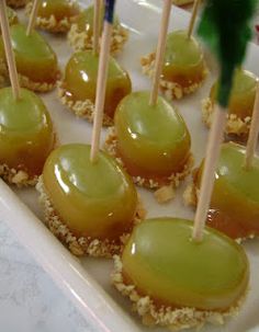 caramel apple bites on a tray with toothpicks