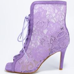 These Sweet Booties Are The Perfect Way To Transition Into Spring! Features An Open Toe Paired With A Closed Back. A Lace Upper And A Lace Up Front. Single Sole Styling And A Stiletto Heel. Fitted Lace Heels For Spring, Fitted Lace-up Heels With Laces, Fitted Purple Heels For Summer, Fitted Lace Open Toe Heels, Purple Lace-up Heels For Spring, Purple Summer Heels, Spring Lace Heels, Fitted Open Toe Heels With Laces, Feminine Lace-up Fitted Heels