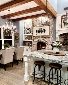 an instagramted photo of a kitchen and dining room