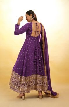 Renting the Purple Anarkali allows you to enjoy luxurious high-end fashion without the commitment of ownership. This ensemble is perfect for making a memorable impression at any special occasion, combining timeless elegance with modern style. Embrace the charm and grace of this stunning outfit and elevate your festive wardrobe effortlessly. Product Details: Anarkali Color: Purple Dupatta Color: Purple Dupatta Fabric: Soft net Anarkali Fabric: Linen Raw Silk, Cotton Silk Work: Zari Weaving & Sequ Purple Anarkali, Engagement Gown, Lehenga Crop Top, Georgette Anarkali, Lehenga Choli Wedding, Party Wear Lehenga Choli, Reception Gown, Bollywood Lehenga, Party Wear Lehenga