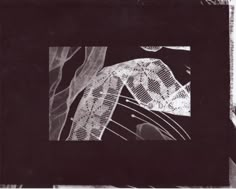 a black and white photo with an abstract design