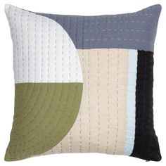 a pillow with different colored squares on the front and back of it, in various colors