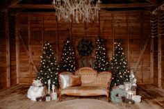 a living room filled with christmas trees and decorations