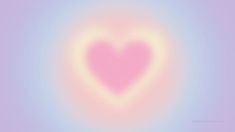 a pink heart on a pastel background