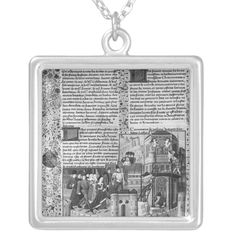 an old book with pictures on it silver plated necklace