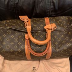 Authentic Louis Vuitton Travel Bag Keepall Bandouliere 45 080415e Code Sa 844 Country Of Manufacturer France In Great Condition! Comes With All Accessories, Organizer And Dust Bag. In Pictures There Is Shadows In Organizer, It’s Brand New! Keepall Louis Vuitton, Louis Vuitton Travel Bags, Louis Vuitton Keepall 55 Bandouliere Sizes, Lv Keepall 45, Accessories Organizer, Louis Vuitton Travel, Louis Vuitton Keepall 50, Louis Vuitton Keepall Vintage, Louis Vuitton Keepall