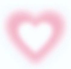 a pink heart shaped object is shown on a white background with soft lightening effect