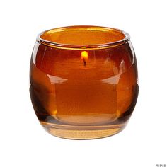 a brown glass vase with a candle in it's center on a white background