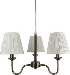 three light chandelier with white shades on the lampshades and one lamp attached