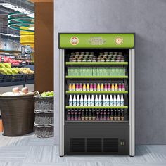 a display case in a grocery store filled with drinks