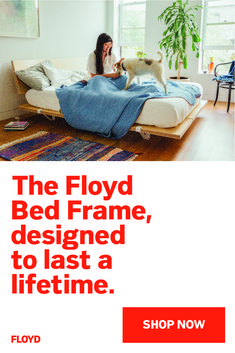 a woman sitting on a bed with a dog in her lap and the caption reads, the floyd bed frame, designed to last a life time