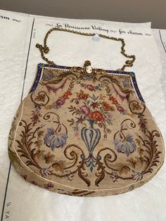 "Stunning Petti point embroidered bag 6.5 \" x  7\".  So lovely, it could be framed. It is strong.  fantastic filigree work in top and enameling. a few repairs that are well done but quite a few. The enamelling on top is amazing." Antique Gold Embroidered Bags, Antique Embroidered Evening Bags, Vintage Evening Bag With Handwork For Formal Occasions, Victorian Style Gold Embroidered Bag, Vintage Embroidered Ceremonial Bags, Victorian Style Rectangular Evening Bag, Vintage Embroidered Pouch Evening Bag, Handmade Victorian Bags, Beautiful Purses