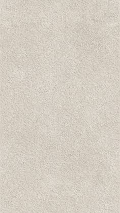 an image of a white textured wallpaper with no lines or dots on it