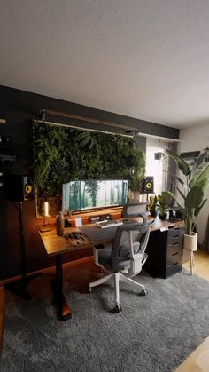 a home office with plants on the wall