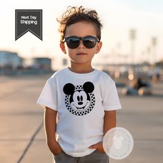 This listing is for the super cute Mickey Checkered Classic Mickey  tee shirt . Lil Cute Tess Co uses Rabitt Skin brand tee shirt , they are a quality cotton tee shirt . The design is directly printed on to the bodysuit using safe eco-friendly inks.  PRODUCTION TIME AND SHIPPING -All orders next business day. Checkered Mickey Shirt, Disneyland Birthday Shirts Boy, Disney Boy Shirts, Disney Shirts Boys, Boys Disney Outfits, Boy Disney Outfits, Boys Disney Shirts, Toddler Boy Summer Fashion, Boy Disney Shirts