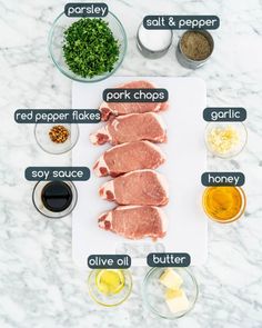 ingredients to make pork chops laid out on a cutting board