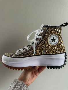 WOMEN'S Crystal Rhinestone and pearl embellished shoes. Handmade to order. -Please Note all Orders are Handmade and eligible for customization. -Converse sneakers tend to run a half size to one full size larger. I suggest trying on the style of converse prior to placing the order. Make sure your size is correct before purchasing. If Your Size or a color that you would like Is Not Listed, Please Contact Us. -Please enter as much detail in the personalization box that you wish for your shoes. I can add names to the tongue of the shoe & going down the back of the shoe.  WASHING AND CARE INSTRUCTIONS: As this is a delicate and sensitive item we do recommend washing by hand. Should the jewels become detached while washing, wait until the clothing dries, put it back in place, place a thick piece Gold Embellished Sneakers With Round Toe, Embellished Gold Sneakers With Round Toe, Gold Embellished Round Toe Sneakers, Luxury Custom Sneakers With Rhinestones And Round Toe, Embellished Converse, Bejeweled Shoes, Upcycle Shoes, Rhinestone Converse, Bedazzled Shoes Diy