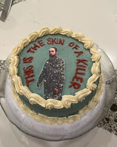 there is a cake that has been decorated with the image of a man