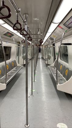 an empty subway car with no passengers on it