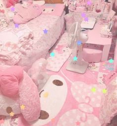 a bedroom with hello kitty bedding and pink furniture