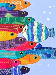 an image of colorful fish in the water