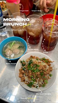 a table topped with plates of food and drinks